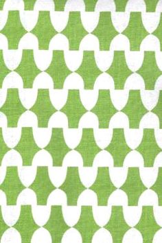 a green and white fabric with circles on it