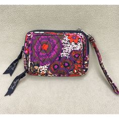 Brand: Vera Bradley Style: Wallet Color: Multicolor - See Images Pattern: Floral Closure: Zipper Sold As Pictured ( Please See Images For More Details ) ( Colors And Measurements Are Approximate ) -30 Day Returns On Unused/Unworn Items By Buyer. -100% Authenticity Guaranteed -Items Ship Within 1-2 Business Days -Please Contact Us Regarding Any Issue Or Concern Thanks For Looking! Versatile Multicolor Travel Wallets, Purple Rectangular Bag With Card Slots, Purple Pouch Coin Purse For Everyday Use, Purple Pouch Coin Purse For Daily Use, Purple Coin Purse For Daily Use, Purple Coin Purse Pouch, Purple Rectangular Clutch For Travel, Multicolor Wristlet With Removable Pouch For Everyday Use, Purple Clutch For Travel