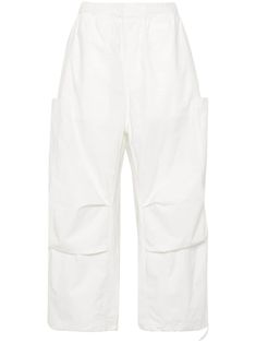 Straight Cargo Pants With Loosely Fitted Hips, White Cargo Pants With Elastic Waistband For Streetwear, Sporty Straight Parachute Pants With Cargo Pockets, Oversized White Straight Leg Bottoms, White Baggy Cargo Pants With Elastic Waistband, Sporty Cotton Cargo Pants For Work, Sporty Straight Parachute Pants With Side Pockets, White Baggy Cargo Pants With Hip Pockets, Sporty Cotton Cargo Pants With Patch Pockets