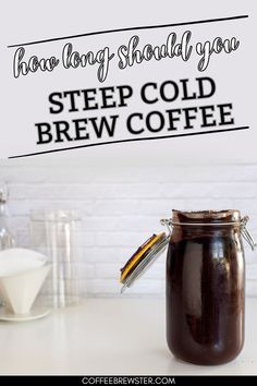 Picture shows a mason jar filled with coffee grounds and water.  Text reads "How long should you steep cold brew coffee.  coffeebrewster.com" Delicious Coffee, Iced Coffee