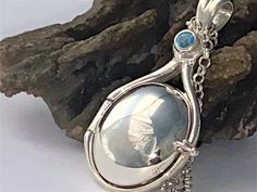 "NEW Hand Made in USA Bugger 46.40 mm x 23.40 mm wide Handcrafted H2O Mermaids Locket Pendant Just add Water The Pendant is encrusted with one gentle 4 mm 0.25 ct.Natural Swiss Blue Topaz Stone . Made of Solid pure .925 Sterling Silver and Choose from drop-down menu Solid .925 Sterling Silver Round Rolo Chain Adjustable 16.5,17.5 up to 18.5 inches or 2.9-4 mm Oval Rolo Chain. High quality Hand polished without scratches as cheap jewelry . The Natural Swiss Blue Topaz stone are stunning,and the S Mermaid Locket, H2o Mermaids, Silver Mermaid, Friend Jewelry, Mermaid Jewelry, Blue Topaz Stone, Swiss Blue Topaz, Topaz Stone, Cheap Jewelry