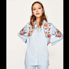 Zara Blue Embroidered Shirt New With Tag Size Medium Color Blue Shoulder 16 Inch Bust 19.5 Inch Length 26-33 Inch Approx Size Measurements Are Approximate Blue Floral Embroidery Blouse For Work, Blue Floral Embroidered Blouse For Work, Embroidered Long Sleeve Light Blue Blouse, Blue Floral Embroidered Workwear Blouse, Light Blue Embroidered Tops For Spring, Zara Light Blue Long Sleeve Shirt, Embroidered Collared Blue Tops, Blue Embroidered Collared Shirt, Blue Embroidered Collared Blouse