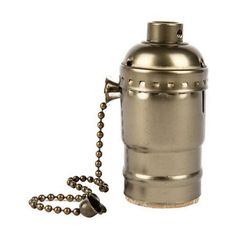 a metal canister with a chain attached to it