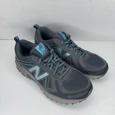 New Balance Women's 410v5 Trail Shoes 9.5 Grey with Blue WT410LO5 2017. Shoes in overall good condition with lots of life left and ready for a new home. Shoes show some signs of use in the way of some scratches and smudges and normal wear mostly just dust (SEE PHOTOS). Sold as seen in photos. What you see is what you will receive. Shipped timely and packaged with care. Don’t miss out. Thanks for looking. Home Shoes, New Balance Women, Trail Shoes, Shoe Show, Brooks Sneaker, New Balance, New Home, The Way, Signs