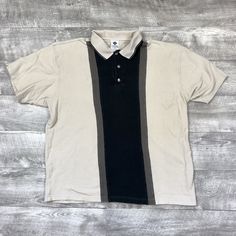 "Vtg Columbia Brown Tan Black Colorblock Polo Shirt. * Men's Size: XL * Columbia Tag * 100% Cotton Measurements Top 2 Bottom: 27\" Pit 2 Pit: 22\" This amazing 90s color clocking Columbia Sports polo is in good vintage condition No signs of any rips or holes Perfect for any retro fan! *Please see all photos as they accurately display the quality of the items*" Black Polo Collar Top With Patchwork, Black Color Block Polo Collar Top, Vintage Black Patchwork Top, Vintage Color Block Tops For Streetwear, Retro Fan, 90s Colors, Color Blocking, Columbia, Polo Shirt