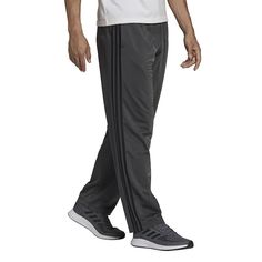 Iconic and cool, these adidas men's track pants are an athleisure must-have. Iconic and cool, these adidas men's track pants are an athleisure must-have. Tricot construction 2-pocketFIT & SIZING Regular fit Elastic waistband with drawstringFABRIC & CARE 100% recycled polyester Machine wash Imported Size: 4XL. Color: Grey. Gender: male. Age Group: adult. Bottom Clothes, Big & Tall, Bottoms Pants, Adidas Men, Track Pants, Athleisure, Harem Pants, Age Group, Track