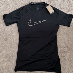 Nike Dri-Fit Training Shirt (Mens) Brand New. Never Worn. Black. Tight Fit. Move To Zero Sustainable Material. Nike Compression Shirt Men, Nike Fitted Sports Shirt, Nike Fitted Shirt For Sports, Fitted Nike Sports Shirt, Fitted Nike Shirt For Sports, Nike Fitted Short Sleeve Top, Nike Fitted Casual Shirt, Nike Fitted Graphic Print Top, Nike Fitted Top With Graphic Print