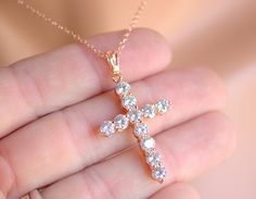 "This is a large 18kt rose gold filled crystal cross pendant necklace for women. This very impressive large cross measures 39x21mm while it sparkles with large CZ crystals! This beautiful cross comes on a 16\", 18', 20\", 22\" or 24\" 14kt rose gold filled cable chain and has a spring clasp in back. This is a stunning statement piece, high quality is guaranteed! Comes nicely boxed for the perfect gift! Model is wearing a 16\" length. All my jewelry is handmade and made to order. This necklace wi Rose Gold Cubic Zirconia Cross Pendant, Crystal Cross Pendant Necklace As Gift, Rose Gold Cubic Zirconia Cross Pendant Necklace, Rose Gold Cubic Zirconia Cross Necklace, Crystal Crucifix Jewelry As Gift, Catholic Jewelry Necklace, Cross Pendant Necklace Woman, 14kt Gold Jewelry, Cross Necklace Women