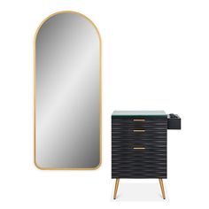 a black dresser and mirror with gold trim