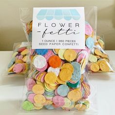 a bag filled with lots of different colored cookies