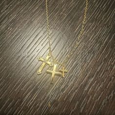 18k Gold Plated Sterling Silver .925 Stamped Necklace Triple Crosses With The Largest One Having Detailed Work On It And The Other Two Just Simple Crosses Crosses Are Affixed And Not Moveable On Chain Adjustable Chain Is 20” With Two Separate Station Clasps At 17.5” And 15.5” Brand New Gold Cross Charm Necklace In 14k, Gold Plated Hallmarked Charm Necklaces, Yellow Gold Cross Charm Necklace Tarnish Resistant, Hallmarked Gold Plated Charm Necklaces, Gold 14k Cross Pendant Charm Necklace, 14k Gold Cross Pendant Charm Necklace, Yellow Gold Tarnish-resistant Cross Charm Necklace, Gold Sterling Silver Charm Necklace With Cross Pendant, Gold-toned Sterling Silver Cross Pendant Charm Necklace