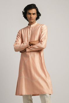 Dusty pink kurta with hand embroidery in wavy pattern, band collar, button placket and full sleeves.
Component: 1
Embroidered
Neckline: Band Collar
Sleeve Length: Full
Fabric: Chanderi
Color: Pink
Note: The pant worn by the model is not for sale - Aza Fashions Spring Embroidered Long Sleeve Bandhgala, Spring Bandhgala With Intricate Embroidery And Long Sleeves, Spring Bandhgala With Chikankari Embroidery And Long Sleeves, Spring Long Sleeve Bandhgala With Chikankari Embroidery, Long Sleeve Bandhgala With Dabka Work For Spring, Designer Bandhgala For Spring With Long Sleeves, Long Sleeve Cotton Silk Sherwani With Dabka Work, Long Sleeve Cotton Silk Sherwani With Intricate Embroidery, Designer Long Sleeve Nehru Jacket For Spring