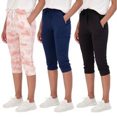 Looking for the perfect pair of joggers for your active lifestyle or casual wear? Look no further than our Women's Soft Capri Joggers! Our 3-pack of joggers are designed to keep you comfortable and stylish no matter what the occasion. Our Women Running Bottoms are made from soft and warm material that's perfect for all-season wear. The drawstring waist and cuff hem provide a comfortable and secure fit that stays in place no matter how active you are. With a range of sizes available, our Capri Jo Capri Joggers, Mens Athletic Pants, Tapered Sweatpants, Soft Sweatpants, Stylish Activewear, Sweatpants With Pockets, Soft Joggers, Plus Size Pajamas, Comfortable Pants