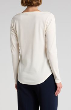 Refresh your essentials with a graceful boatneck long-sleeve top constructed from a stretchy ribbed knit. Boat neck Long sleeves 61% polyester, 33% cotton, 6% spandex Machine wash, dry flat Imported Versatile Long Sleeve Cream Tops, Versatile Cream Long Sleeve Tops, Versatile Long Sleeve Textured Knit Top, Versatile Textured Knit Long Sleeve Top, Cream Long Sleeve Top With Ribbed Cuffs, Cream Knit Top With Ribbed Neckline, Cream Fine Knit Crew Neck Top, Cream Knit Tops With Ribbed Neckline, Cream Fine Knit Tops For Layering