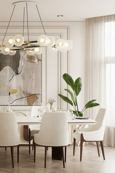 an elegant dining room with white chairs and a large plant in the middle of the table