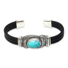 Wayan Asmana designs a trendy cuff that is rich in classic Balinese styling. Crafted by hand of black rubber the bracelet is finely detailed in sterling silver and centered by reconstituted turquoise. .925 Sterling silver Elegant Adjustable Turquoise Bangle, Novica Jewelry, Paw Print Jewelry, Ribbon Jewelry, Jewelry Workshop, Turquoise Bracelet Cuff, Turquoise Cuff, Sterling Silver Cuff Bracelet, Silver Accessories