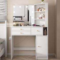 a white vanity with lights on it in a bedroom