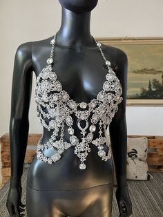 Rhinestone body chain , is made with crystals and pendants Emphasis on the body Chic design, combined with an intense and dazzling shine of silver and crystals. Body jewelry is made of crystal, rhinestone, crystal beads Silver color of luxury His presence is always felt. A lovely combination crystals silver and clear crystal Size 36-38 The whole piece does not have a fabric backbone ; only carefully detailed crystal elements The back part is securely fixed with a chain Female Na'vi, Rhinestone Body Chain, Body Jewerly, Shoulder Jewelry, Body Necklace, Shoulder Necklace, Silver Tiara, Women Corset, Beading Ideas