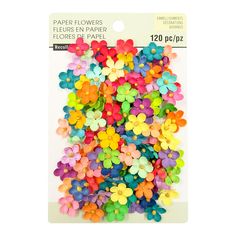 a pack of colorful plastic flowers on a white background with the words paper flowers in it