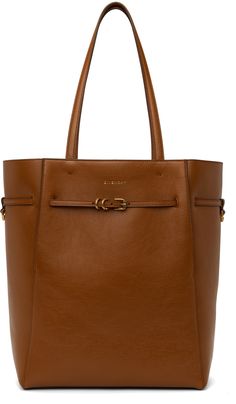 Grained buffalo suede tote in brown. · Fixed shoulder straps · Logo embossed at face · Drawstring pin-buckle strap · Logo-engraved copper-tone hardware · H15 x W16 x D4.5 Supplier color: Soft tan Brown Calf Leather Shoulder Bag With Brass Hardware, Cognac Workwear Bags With Brass Hardware, Timeless Brown Shoulder Bag With Brass Hardware, Brown Shoulder Bag With Branded Hardware For Work, Timeless Brown Shoulder Bag With Metal Hardware, Givenchy Logo, Embossed Bag, Oxblood Red, Tan Bag