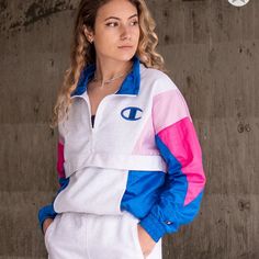 -Brand New With Tags Attached -Mixed Construction With Grey Sweatshirt-Style Chest And Multi-Colored Windbreaker Panels In Pink And Blue Throughout -Features Elastic Sleeve Cuffs And Bottom Hem, Kangaroo Pouch Pocket, Quarter Zip-Up Closure With Mock Neck, And Champion Logo At The Left Chest -83% Cotton, 17% Polyester Sporty Pink Track Jacket With Pockets, Sporty Pink Tops With Pockets, Sporty Pink Top With Pockets, Trendy Pink Long Sleeve Track Jacket, Casual Pink Half-zip Outerwear, Fitted Pink Casual Track Jacket, Sporty Pink Sweatshirt With Pockets, Casual Pink Track Jacket With Pockets, Pink Cotton Athleisure Outerwear