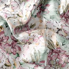 an image of a flowery fabric with pink flowers on the bottom and green leaves in the middle