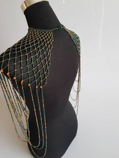 "This shoulder necklace is 100% handmade. Perfect for weddings , African themed events, cultural events or any other event. The list is endless.... Size; 22\" long for the longest strand. 16\" around the neck. **Buy multiple items and pay shipping for 1 item only.The rest ships free. More neckleces here; https://www.etsy.com/shop/TribalTess?ref=seller-platform-mcnav&section_id=21306083 Back to my shop; https://www.etsy.com/shop/TribalTess?ref=seller-platform-mcnav" Handmade Bohemian Bridal Necklace For Party, Bohemian Beaded Necklace With Dangling Beads For Wedding, Bohemian Beaded Necklaces With Dangling Beads For Weddings, Bohemian Beaded Necklaces With Large Beads For Weddings, Beaded Long Bridal Necklace For Party, Beaded Long Bridal Necklace, Bohemian Wedding Beaded Necklaces With Large Beads, Elegant Handmade Body Jewelry For Festival, Bohemian Tiny Beads For Wedding