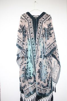 Kimono, kimono women, kimono robe, kimono cardigan, kimono jacket, Flowy Bohemian Kimono with Floral Pattern, Cover-up, beachwear, bohemian Hand Wash Material: Polyester, Chiffon, Lace. 100% Brand New  Match well with jeans and T-shirts or vest,as a cute coat over a long t shirt dress,tie it up or free flowing.Fun to create different style for wear. Style: Cute Bohemia floral print, Open Front, bat sleeve, loose fit, boho style, Shawl sheer chiffon kimono, match for bikini, swimwear, beachwear o Bohemian Long Sleeve Kimono With Fringe, Spring Fringed Long Sleeve Kimono, Spring Fringe Long Sleeve Kimono, Spring Long Sleeve Fringed Kimono, Fall Beach Kimono With Tassels, Long Sleeve Festival Kimono With Fringe, Festival Long Sleeve Kimono With Fringe, Long Sleeve Fringe Kimono For Festivals, Spring Kaftan With Tassels And Kimono Sleeves