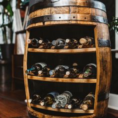 a wooden barrel filled with lots of wine