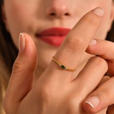 Introducing our stunning 14K Gold Minimalist Emerald Ring, a true embodiment of elegance and charm. This dainty diamond ring boasts a stackable design, making it perfect for mix and match with other gold rings in your collection. The mesmerizing green gemstone, carefully handcrafted and set in 14K gold, adds a touch of vibrancy to any outfit. Not only is this exquisite piece a gorgeous accessory, but it also holds sentimental value as the May birthstone gold ring, making it an ideal birthday gif Smaragd Ring, Dainty Diamond Ring, Green Gemstone Ring, Ring Making, Gold Rings Stackable, May Birthstone, Birthday Gif, White Gold Band, Green Gemstones