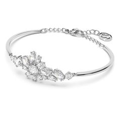 Embrace designs inspired by nature's enchanting beauty. Swarovski's enduring quest for innovation, beauty and excellence is characteristic of their exquisite designs. Take on today's trends with style in a stunning Swarovski Crystal Gema Flower bangle bracelet. -Enjoy free cleaning and inspection at any Day's location for life of this Swarovski Crystal flower bracelet -Bracelet minimum length: 6 1/2" -Bracelet maximum length: 7 7/8" -Bracelet measures 1 5/8" wide -Bracelet features lobster clasp Bracelet Flower, Flower White, Wide Bracelet, Swarovski Jewelry, Crystal Flower, Flower Bracelet, Engraved Items, Watch It, Floral Motif