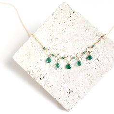 "Free Shipping on one of our best selling styles, this rainbow gemstone necklace is classic and delicate. We hand-select each beautiful, crystal-clear gemstone. Gemstones are garnet, peridot, amethyst, citrine and champagne quartz. Necklace is 16\"-18\" long with a 2\" extender chain and has a spring ring clasp. Made of 14k gold plated fine Italian sterling silver. Stamped for authenticity. Our unique plating technique makes our gold plated jewelry tarnish resistant. All of our earrings and neck Light Blue Necklace, Green Onyx Necklace, Dainty Gemstone Necklace, Gold Gemstone Necklace, Blue Gemstone Necklace, Briolette Necklace, March Birthstone Necklace, Aqua Aura Quartz, Silver Gift Box