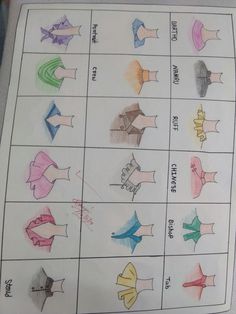 an image of different types of paper fish on a white sheet with colored pencils