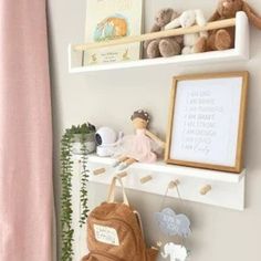 two white shelves holding stuffed animals and toys