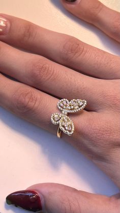 Elevate your style with our stunning 14-karat gold-plated butterfly ring, adorned with sparkling cubic zirconia stones. This elegant piece is designed for those who love a mix of dainty and fashionable jewelry. Perfect for adding a touch of nature-inspired beauty to your look, this ring is versatile enough for everyday wear or special occasions. Its affordable luxury makes it a great gift for loved ones or a trendy addition to your own jewelry collection. Shop now to enjoy a blend of elegance and affordability! Follow us on instagram @jewelrybyana for more trending jewelry ideas. Gold Butterfly Ring, Ring Butterfly, Animal Ring, Animal Rings, Trendy Ring, Fashionable Jewelry, Butterfly Ring, Butterfly Jewelry, Gold Butterfly