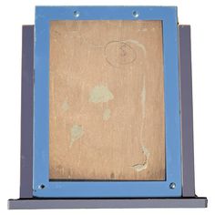 an old blue frame with some writing on it