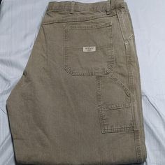 New Wrangler Carpenter Jeans Desert Tan Color Size 42x32 Relaxed Fit New Never Worn Cotton Jeans With Pockets For Rodeo, Cotton Bottoms With Pockets For Rodeo, Cotton Jeans For Rodeo, Rugged Jeans With Pockets For Rodeo, Casual Bottoms With Pockets For Rodeo, Vintage Cotton Bottoms For Rodeo, Carpenter Jeans, Wrangler Jeans, Jeans Brands