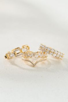 This three piece stacked ring set will be your new go to when you want to sparkle! This glitzy set features three 18k gold dipped crystal rings, perfect for layering with some basic bands! Simple Gold Band, Wedding Branding, Camera Icon, Nail Ring, Stacking Ring Set, Beaded Jewelry Designs, Gold Band Ring, Gold Dipped, Cute Rings