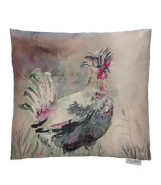 a pillow with a painting of two chickens on it's back and one chicken in the background