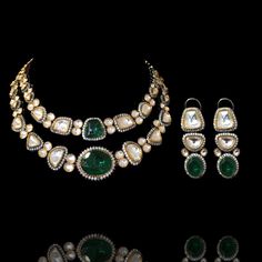 Impeccably flawless layout with ravishing regalia! Delve into a charismatic fantasy with sophistication of kundan and emerald stones to achieve understated elegance. The set includes a necklace and a pair of matching earrings. Approximate earrings length is 1.5". Please click on the video for a detailed view of the product. Designed over high-quality brass as base metal with gold and silver plating. Made by order. Kindly allow 5-7 weeks for the delivery of this item. For custom or urgent request Kundan Bridal Necklace With Matching Earrings In Temple Style, Traditional Emerald Kundan Necklace For Formal Occasions, Formal Temple Jewelry Kundan Necklace With Matching Earrings, Elegant Designer Jewelry For Festive Occasions, Elegant Designer Festive Jewelry, Festive Emerald Kundan Chandbali Necklace, Elegant Kundan Hand Set, Designer Green Kundan Necklace With Cutdana, Green Kundan Necklace With Cutdana For Designer Wear