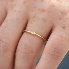 Золотое кольцо вечности с блестящими бриллиантовыми элементами – ARTEMER Minimalist Eternity Band With Diamond Accents, Minimalist Eternity Band With Diamond Accents As Promise Ring, Cubic Zirconia Stackable Rings With Single Diamond, 14k Gold Eternity Band With Single Diamond For Anniversary, Dainty Eternity Band With Diamond Accents, Dainty Round Band Diamond Ring With Single Cut Diamonds, Fine Jewelry Yellow Gold Eternity Band With Single Diamond, Gold Eternity Band With Single Diamond, Fine Jewelry, Gold Eternity Band With Single Diamond