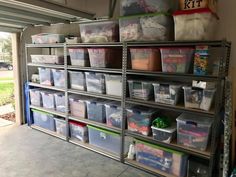 a garage filled with lots of plastic containers and bins