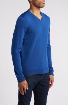 The only thing more wonderful than a smooth and polished-looking merino wool sweater is the fact that it's washable—your life just got easier! 28" length (size Medium) V-neck Ribbed cuffs and hem 100% merino wool Machine wash, dry flat Imported Men's Clothing Blue V-neck Fine Knit Sweater, Blue Merino Wool Top For Workwear, Blue Merino Wool Tops For Work, Blue Merino Wool Tops For Workwear, Blue Cashmere V-neck Sweater, Blue Merino Wool Fine Knit Sweater, Blue V-neck Cashmere Sweater, Blue Fine Knit Merino Wool Top, Fine Knit Merino Wool Blue Top