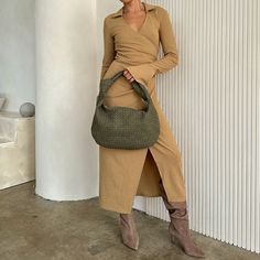 The Brigitte is a fine example of our attention to detail and quality. Its intricate basket woven handmade design and buttery soft feel adds a touch of luxury to this understated hobo bag. The slouchy shape allows it to fit perfectly under your arm. Features interior zip and slot pockets. * Recycled Vegan Leather * 15"W x 9"H x 2.7"D * Handle Drop: 4" * Zipper Closure * Gold-Tone Hardware * Interior Zip & Slot Pockets * OEKO-TEX Certified Lining * Fits up to a standard-size tablet Personalised Jewellery Necklaces, Levis Outfit, Melie Bianco, Black Leather Shorts, Basket Woven, Leather Weaving, Large Shoulder Bags, City Style, Top Sales