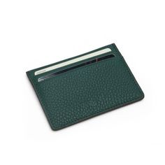 Crafted from pebble pattern calf skin, this card holder for men exudes elegance and durability. The rich green color adds a touch of sophistication, making it a stylish accessory for any modern man.   Key Features:     Material:  Pebble pattern calf skin   Color:  Green   Size:  10 x 7.3 cm   Structure:  4 credit card slots and one top pocket   With four credit card slots and a top pocket, this card holder offers ample space for your essential cards while maintaining a sleek and compact design.