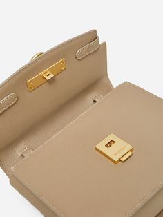 Unlocked Box Flap Bag takes classic elegance and accentuates it with our signature lock closure, inspired by an antique door handle. Day or night, you’ll find yourself instinctively reaching for this minimal masterpiece. - Full-grain cross grain calfskin from USA - Matching color microsuede interior - One internal slip pocket - One adjustable shoulder strap - Care: Wipe clean with damp cloth - Height: 6.5" - Length 8" - Depth: 3.25" - Weight: 1.2 lb - Cross-body - Shoulder Bag Parisa Wang, Antique Door, Vintage Door, Modern Minimalism, Purses Designer, The Grace, By Grace, Grace Kelly, Flap Bag