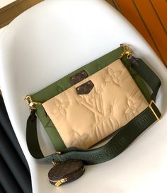 LV Maxi Multi Pochette Accessories handbags are made of Econyl recycled nylon. It has a Monogram embroidered exterior for a fluffy cushioned feel and a Mini Monogram printed Econyl lining. Featuring multiple pockets and compartments, it brings together the Pochette Accessories Clutch, Pochette Accessories Mini Clutch and Round Coin Purse in one place. Dark green/Apricot. 100% Econyl recycled nylon. Monogram coated canvas Econyl-trim. Mini Monogram printed Econyl lining. Gold toned ... Lv Multi Pochette, Round Coin Purse, Business Lady, Pochette Accessories, Louis Vuitton Travel, Lv Purse, Lady Girl, Lv Handbags, What's App