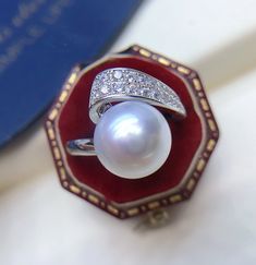 Stunning South Sea White Pearl Ring, 10.3mm, Bright Silvery White, High Luster. Beautiful Artistic ring.   Sterling Silver S925 with sparkling cubic zircons, Very Well made and Comfortable to wear. Open end fits 6-8 US size.  Stunning and Elegant   Lustrous Beauty  Pearl ★ Genuine South Sea Pearl ★ Sizes: 10.3mm ★ Shape: Round Barpque ★ Color: Natural Untreated, Bright Silvery White Color, Beautiful ★ Luster: Very High Luster, Wonderful ★ Surface: Nice, Mirror Like, gentle texture, Mostly clean Clean Rings, White Pearl Ring, Sea Pearl, South Seas, South Sea Pearls, Ring Fit, Pearl Size, Pearl Ring, White Pearl