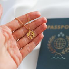 World Map Necklace - Sterling Silver or 24ct Gold Vermeil Celebrate your love for travel with this stunning world map charm necklace. Crafted with care, this delicate piece is perfect for wanderers, adventurers, and those who dream of exploring new places. The minimalist map pendant represents the beauty of the world and serves as a reminder of past adventures and future journeys. Made from high-quality sterling silver or 24ct gold vermeil, this necklace is perfect for layering or wearing solo. World Map Necklace, World Necklace, Map Jewelry, Map Pendant, Map Necklace, Eco Friendly Gifts, Travel Gifts, Necklace Gift, Gift Christmas