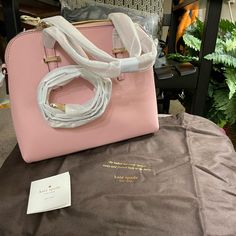 This Is A Kate Spade Brand New With Tags, Never Been Taken Out Of The Package Yet, Purse. Will Be Packaged With The Dust Bag, As Shown. Any Questions, Please Ask Pink Shoulder Bag For Office, Pink Handheld Satchel For Office, Pink Satchel For Office, Pink Satchel With Adjustable Strap For Office, Pink Office Satchel With Adjustable Strap, Feminine Pink Satchel For Travel, Feminine Pink Travel Satchel, Pink Top Handle Office Bag, Feminine Pink Satchel With Detachable Handle